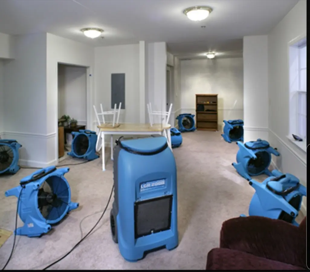 Air movers and dehumidifier setup for Water Damage Restoration in Oak Point